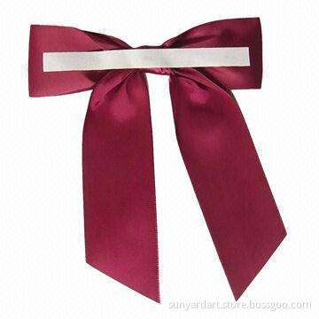 Polyester ribbon gift bow tie with adhesive tab at back, burgundy color